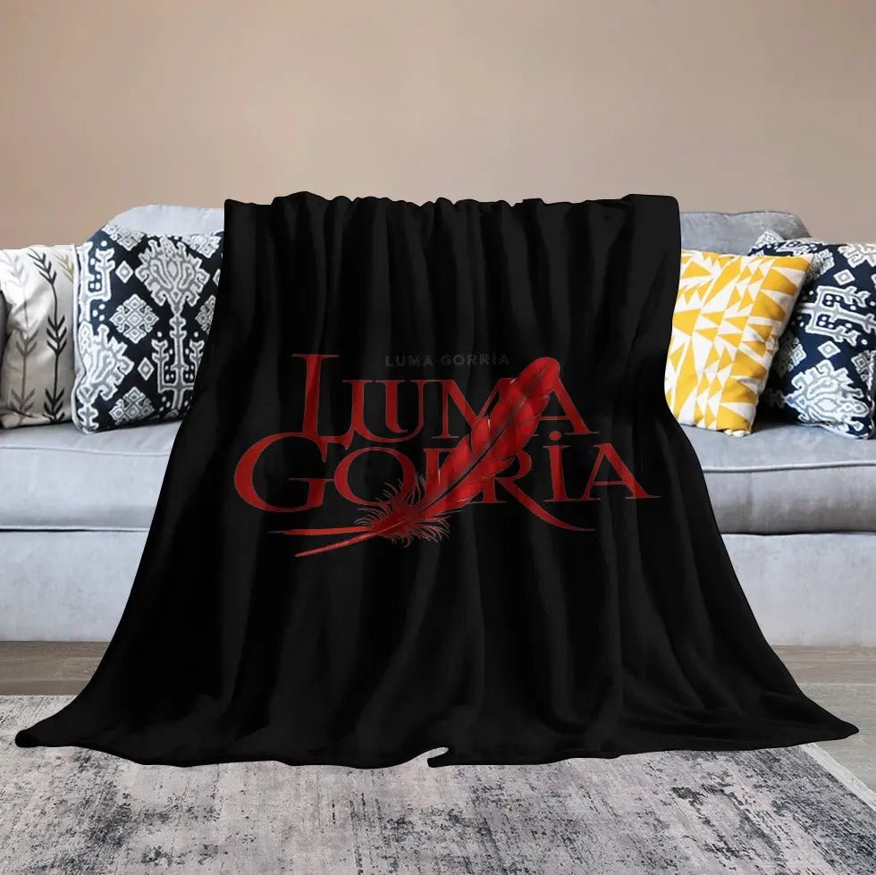 Couverture en Flanelle Ultra Douce  posé sur un canapé