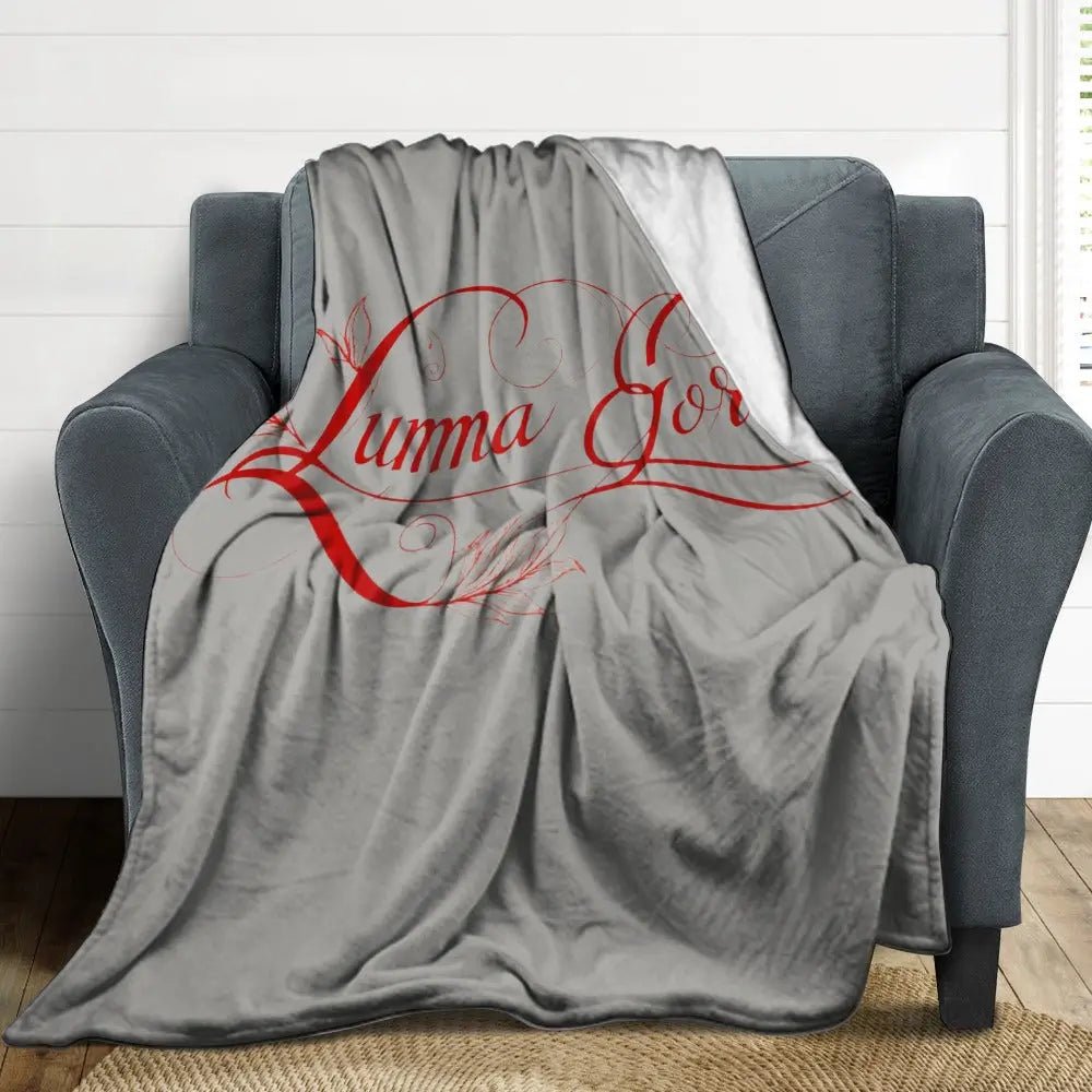 Couverture en Flanelle Ultra Douce –  posé sur un fauteuil
