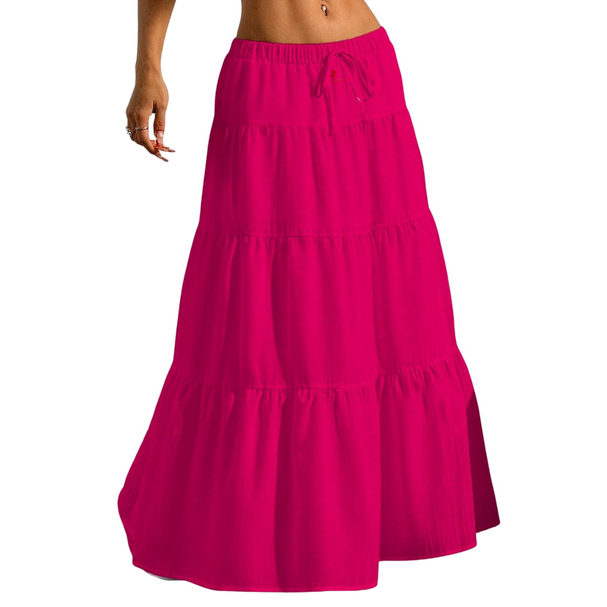 Jupe longue femme fluide à volants porté par le bas dune femme de face coloris rose fuchsia