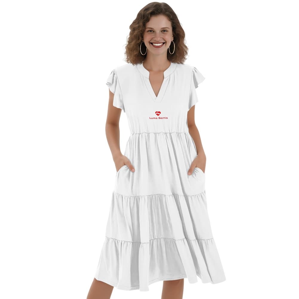 une femme qui porte robe midi patchwork femme col v de face  coloris blanc manches courtes