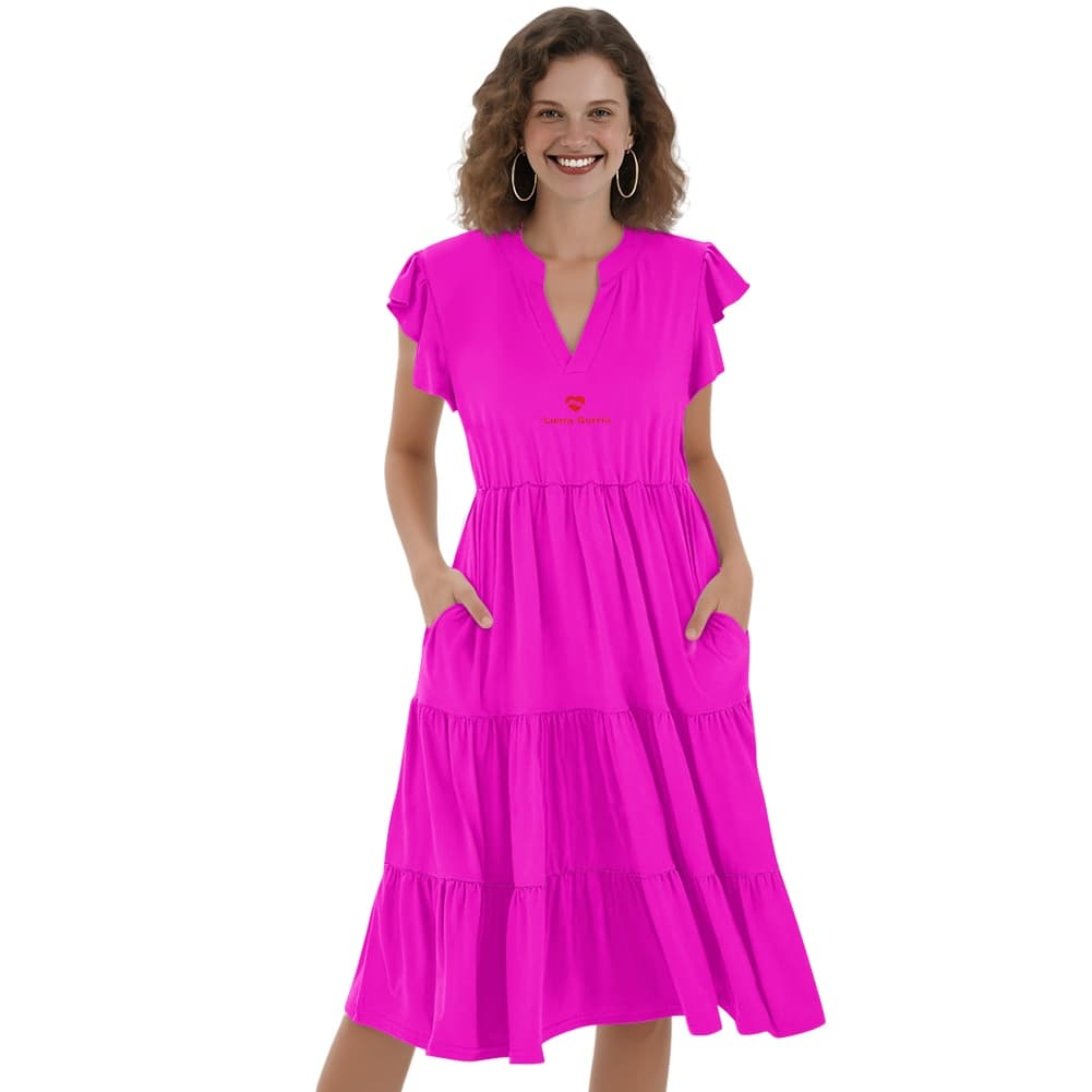 une femme qui porte une robe midi patchwork femme col v manches courtes de face coloris rose fuchsia