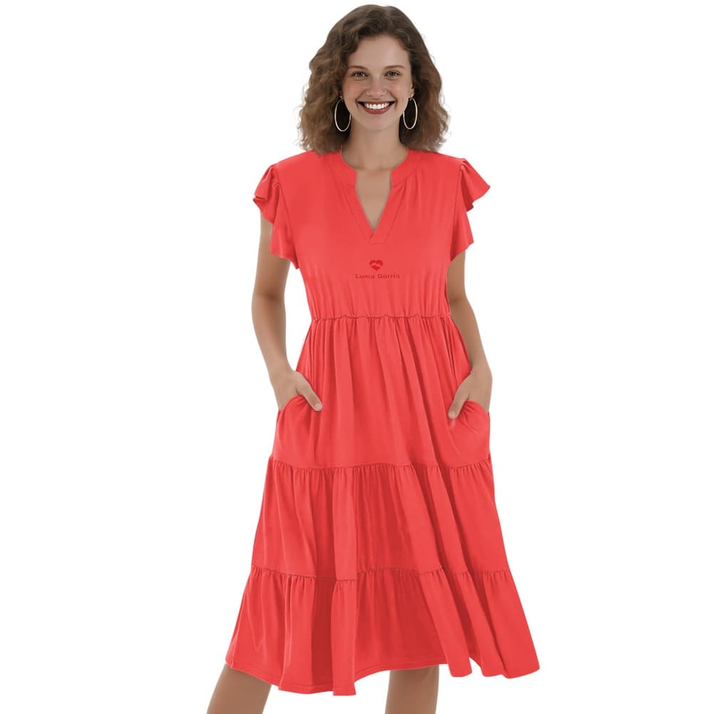 une femme qui porte  une robe midi patchwork femme col v de face manches courtes coloris rouge